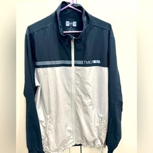 Travis Mathew lightweight gold jacket with full zip.